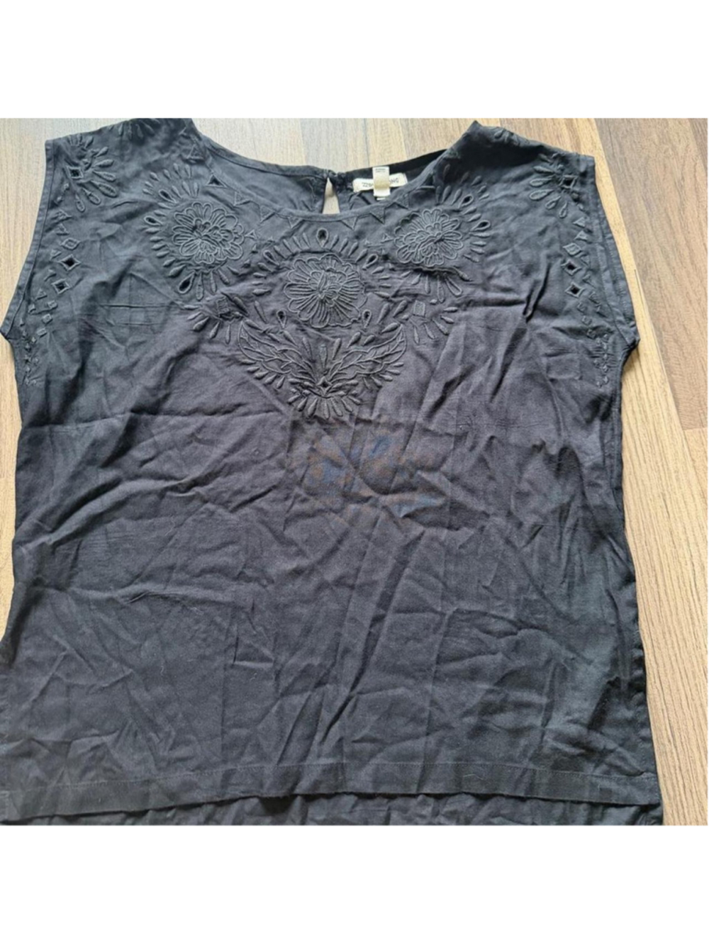 Black embroidered boho tunic top with tonal floral embroidery and cutout eyelet